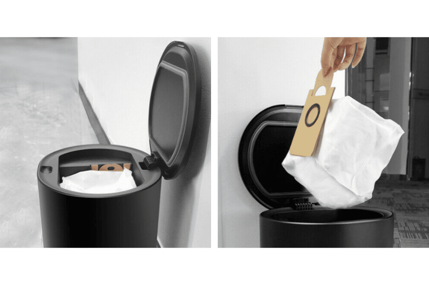 из автоматической всасывающей станции вытаскивается пылесборник